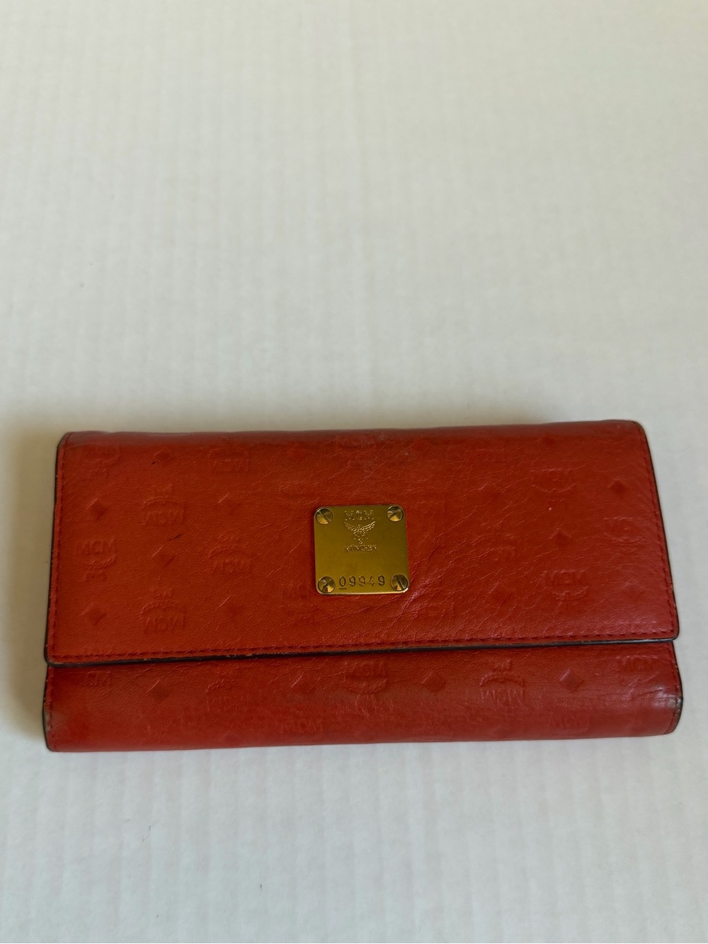 MCM Orange Red Leather Continental Wallet with Gold Plaque